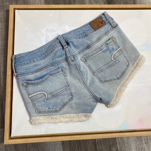AE 4 shortie pom pom fringe distressed jean shorts - Picture 3 of 8